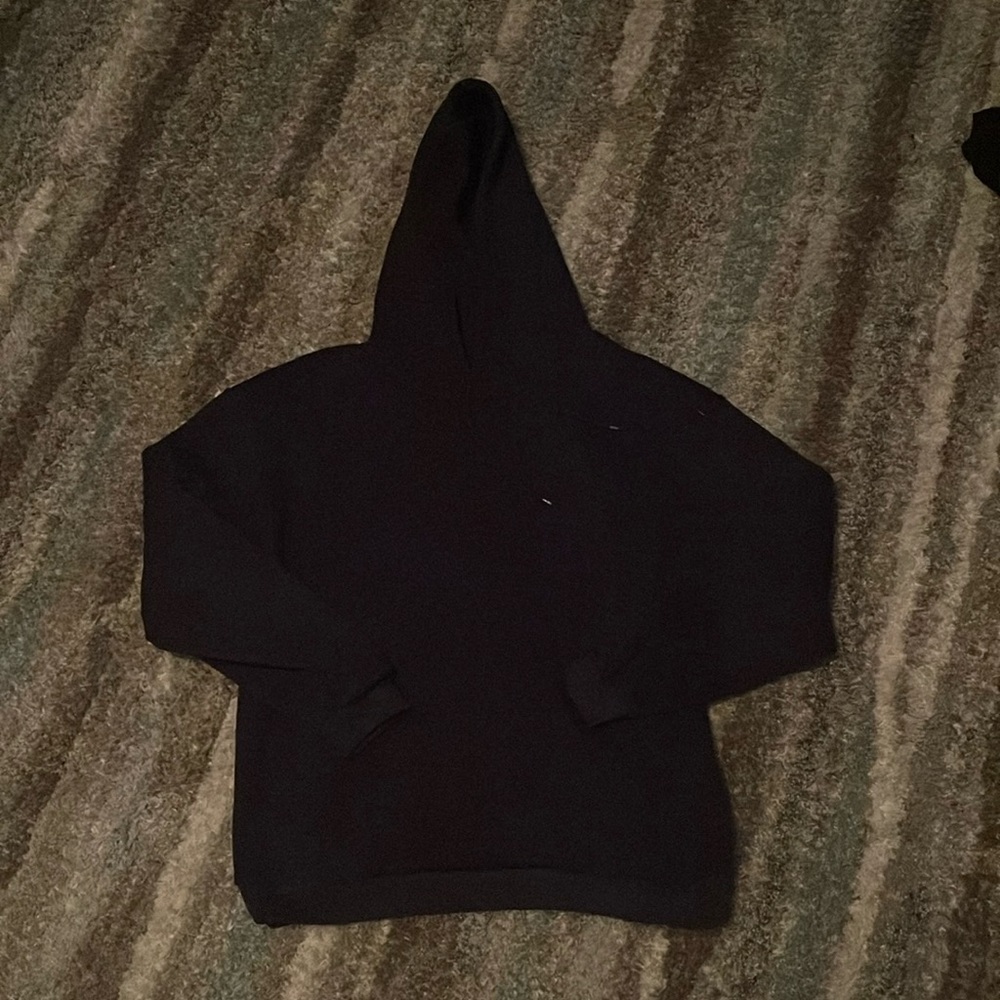 Dark blue hoodie with quote.